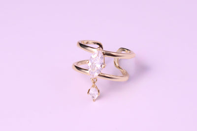 the leana ring — open-ended ring with dangling moissanite stones