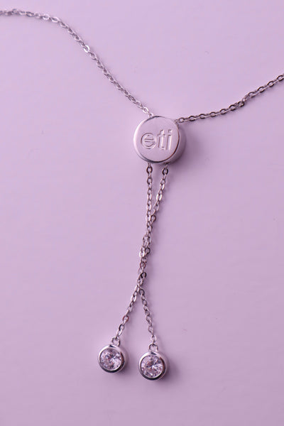 the victoria necklace — engraved disc charm necklace with blue heart stone