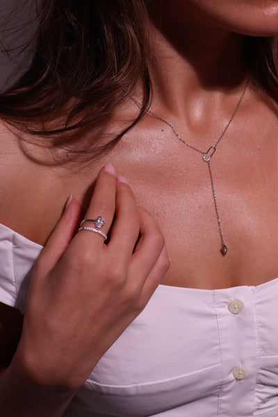 the natalie ring — pear cut moissanite wrap ring