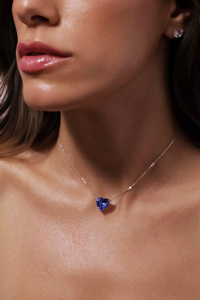 the victoria necklace — engraved disc charm necklace with blue heart stone