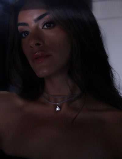 the sol choker — double wrap cord choker with moissanite teardrop pendant